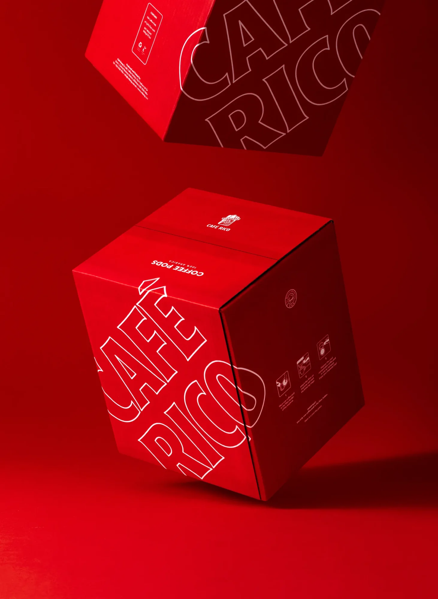 Café Rico coffee pod box tumbling through the frame, packaging photography